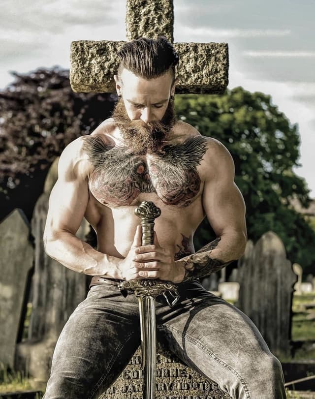 Bearded and inked OnlyFans creator